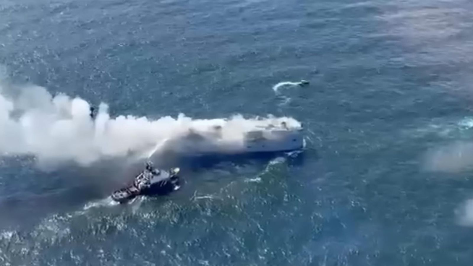 Boats and helicopters were used to get the 23 crew members off the ship  after they failed to put out the blaze, the Dutch coast guard said.