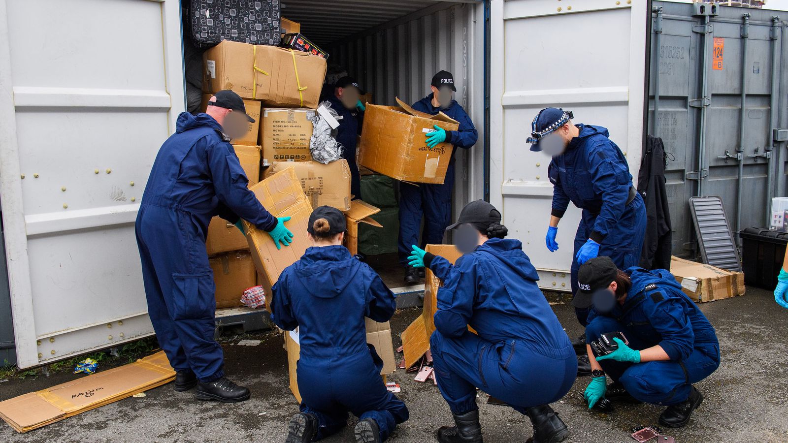 Counterfeit goods worth record £870m found as police raid shipping containers in Manchester