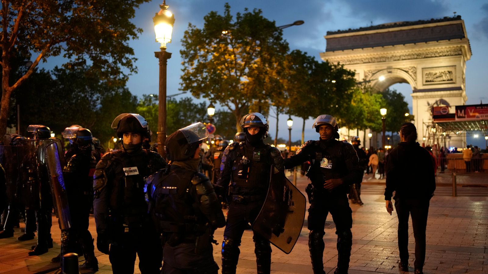 France riots: Heavy police presence at Champs-Elysees in protest ...