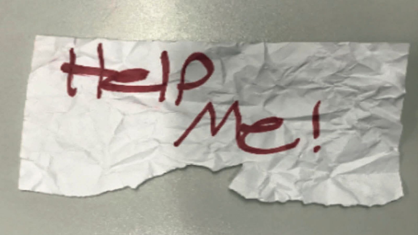 Kidnapped 13-year-old girl rescued after holding 'Help Me!' note in captor's car