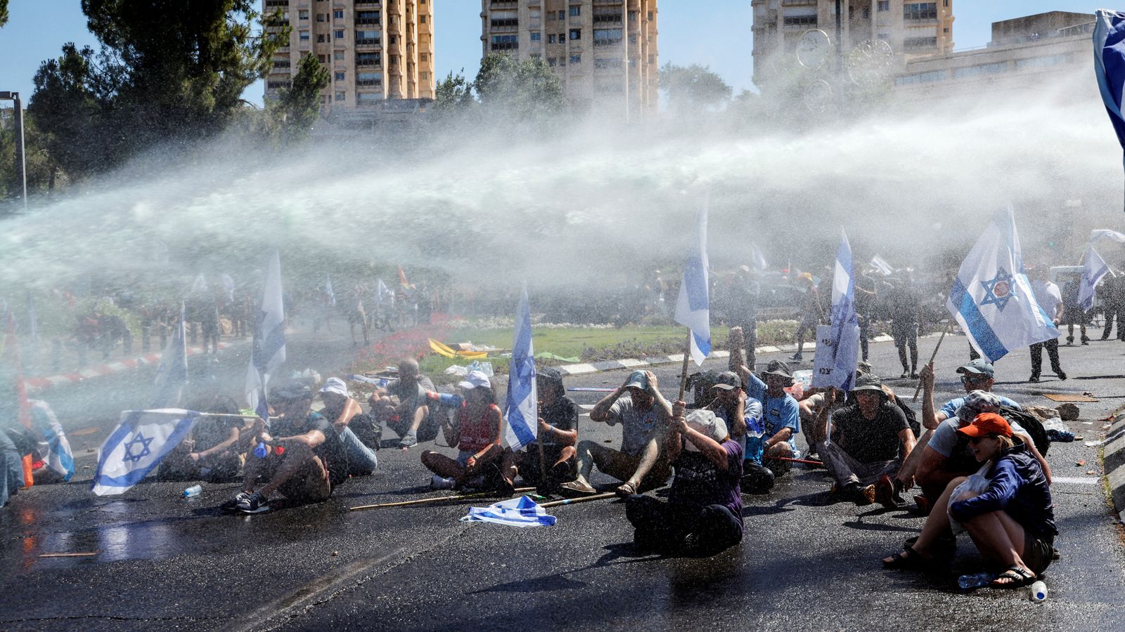 Protests in Israel as parliament approves key part of controversial changes to justice system