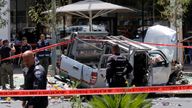 Israeli security personnel work at the scene of a ramming attack in Tel Aviv, Israel 