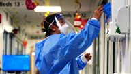 File photo dated 21/12/21 of a nurse putting on full PPE on a ward for Covid patients at King&#39;s College Hospital, in south east London. The Government wasted billions of taxpayers&#39; money on unusable personal protective equipment (PPE) and has an "alarming" lack of plan for an emergency stockpile for future pandemics, MPs have warned. Issue date: Wednesday July 5, 2023.