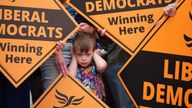 Four year old Sam Palmer-White covers his ears during the celebrations as newly elected Liberal Democrat MP Sarah Dyke meets up with party leader Sir Ed Davey in Frome, Somerset, after winning the Somerton and Frome by-election. Picture date: Friday July 21, 2023.
