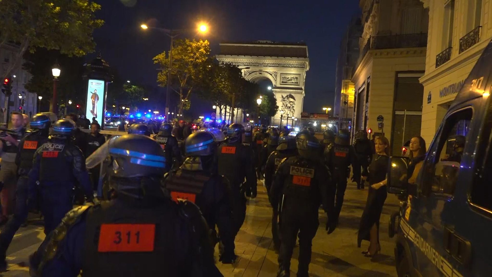 Paris protests: Scenes of destruction on Champs Elysées