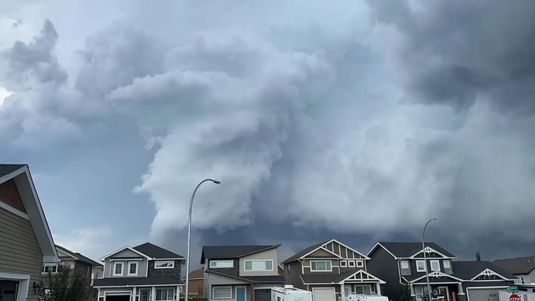 That's crazy!': Watch as a tornado causes huge hail stones to drop