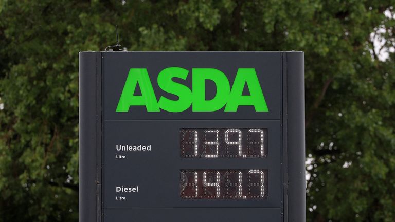 Fuel prices are displayed on a board at a filling station, at an ASDA supermarket in Birkenhead, Britain, July 3, 2023. REUTERS/Phil Noble
