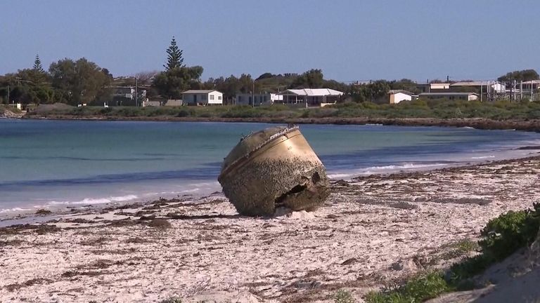 Unidentified object washes up on Australian beach