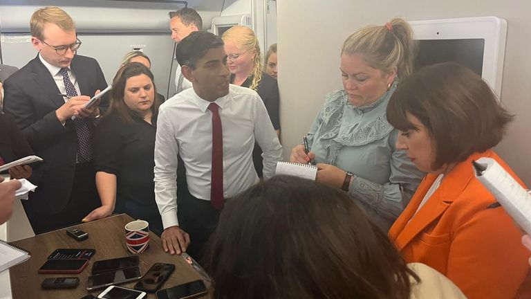 Rishi Sunak speaks to reporters during the flight to the NATO summit