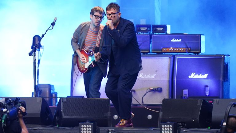 Graham Coxon and Damon Albarn of Blur performing on stage at Wembley Stadium in London. Picture date: Saturday July 8, 2023. PA Photo. See PA story SHOWBIZ Blur. Photo credit should read: Ian West/PA Wire