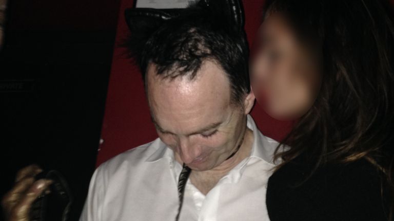 CPS handout pic, shown at Southwark Crown Court, shows former Met Police sergeant Frank Partridge wearing cat ears and a lead while dancing in a Soho nightclub.