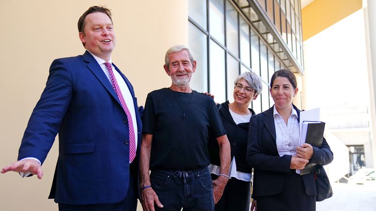 David Hunter with his defence team and Michael Polak, the director of Justice Abroad, speaking to the media outside Paphos District Court in Cyprus 
