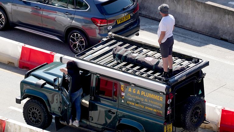 Travellers queue for ferries at the Port of Dover, Kent, where passengers are facing up to a two-hour wait for checks by French border officials due to a high volume of tourist traffic beginning the summer getaway early and heavy freight traffic. Picture date: Friday July 7, 2023.