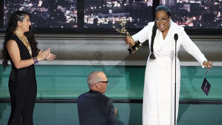 Oprah Winfrey presents an award to Michael Keaton at last year&#39;s awards