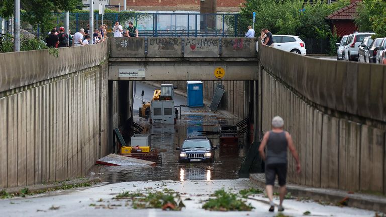 People check the damage after a powerful storm, in Zagreb, Croatia, Wednesday, July 19, 2023. A powerful storm with strong winds and heavy rain hit Croatia and Slovenia on Wednesday, killing at least four people and injuring several others, police and local media outlets said. (AP Photo)