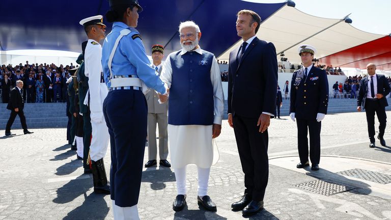 Indian Prime Minister Narendra Modi and French President Emmanuel Macron attend the annual Bastille Day military parade, in Paris, France.