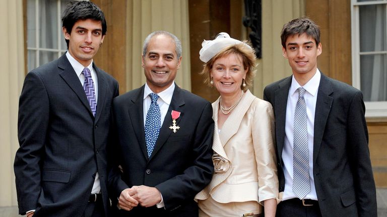 News reader George Alagiah accompanied by his wife Frances and sons Adam, 21, left and Matt, 17, at Buckingham Palace, after collecting his OBE from the Queen in 2008 
