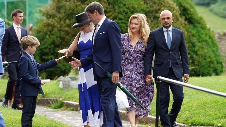 Jon Sopel (centre) and Sajid Javid (right) arrive at St Mary&#39;s Church in Brunton