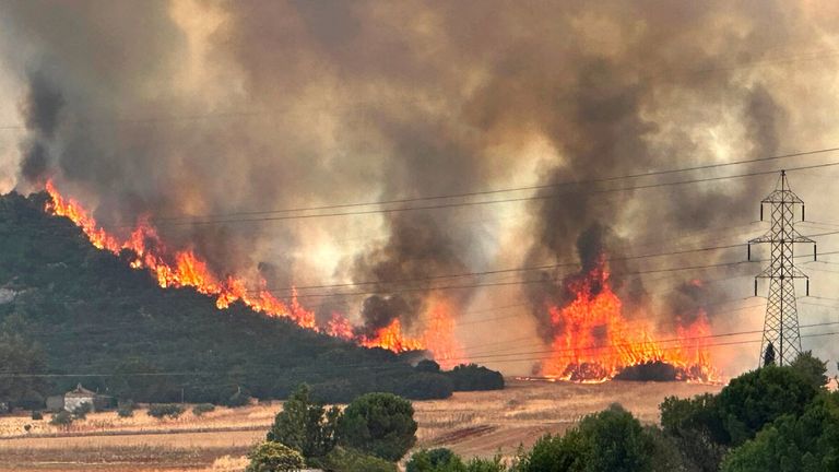 Smoke rises from a wildfire near the village of Agios Sotira, west of Athens, Greece, July 20, 2023