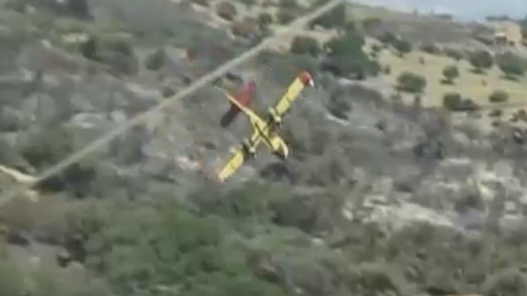A firefighting plane crashes on the island of Evia near Athens during an attempt to put out a wildfire.