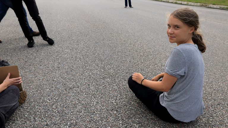 Swedish climate activist Greta Thunberg protests on the street on the day of a court appearance at the Malmo District Court, in Malmo, Sweden July 24, 2023. TT News Agency/Andreas Hillergren/via REUTERS ATTENTION EDITORS - THIS IMAGE WAS PROVIDED BY A THIRD PARTY. SWEDEN OUT. NO COMMERCIAL OR EDITORIAL SALES IN SWEDEN.
