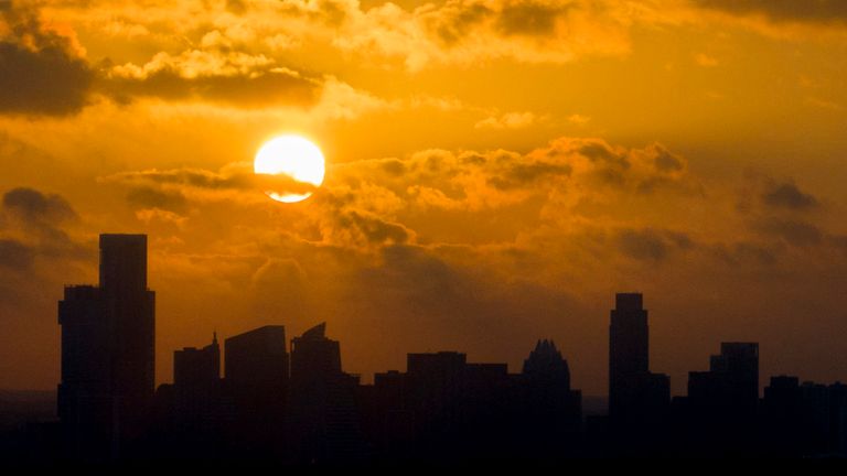 The sun rises over Austin, Texas. Pic: AP