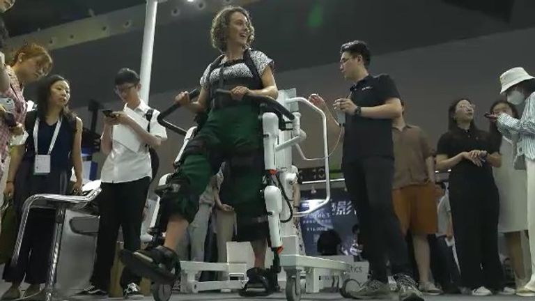 Sky News&#39; Asia correspondent Helen-Ann Smith tests out a device which patients learn to walk again 