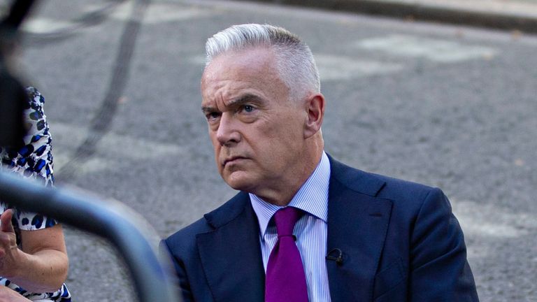 BBC News presenter Huw Edwards sits on the ground in Downing Street

24 Jul 2019