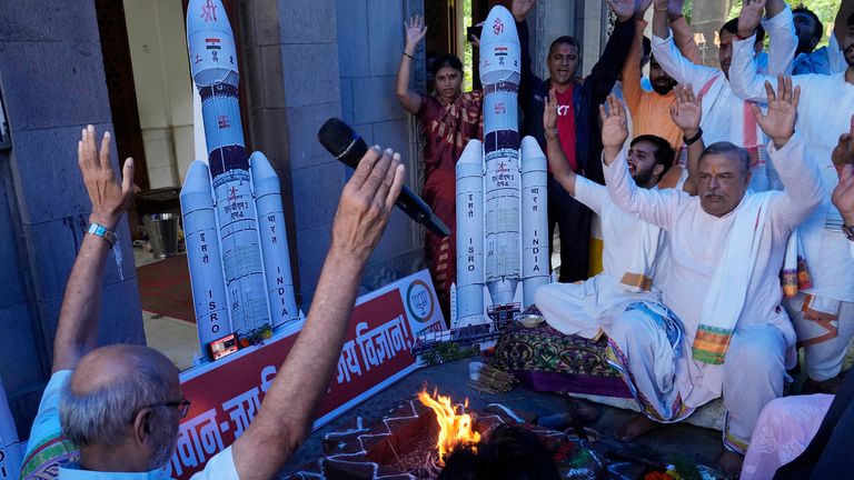 Members of India&#39;s Bharatiya Janata Party perform Hindu rituals for the success of Indian spacecraft Chandrayaan-3 inside a temple in Mumbai Pic: AP