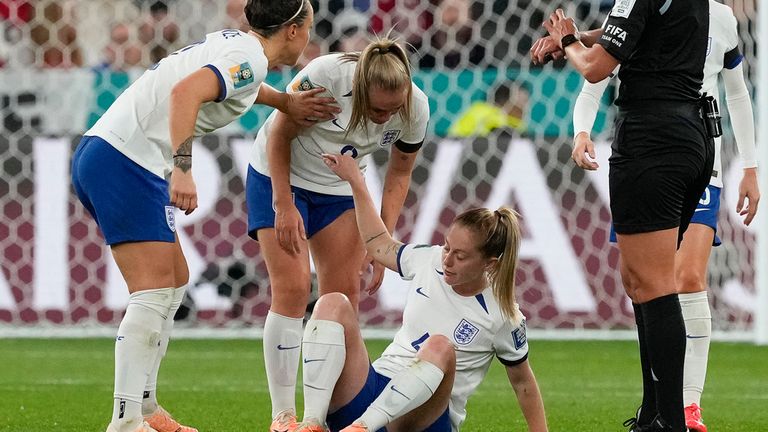 England&#39;s Keira Walsh center sits on the pitch after an injury during the Women&#39;s World Cup Group D soccer match between England and Denmark at the Sydney Football Stadium in Sydney, Australia, Friday, July 28, 2023. (AP Photo/Mark Baker)