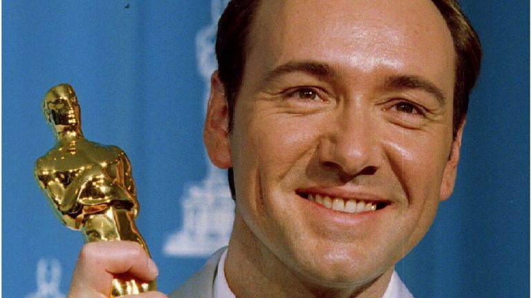 Kevin Spacey holds up his Academy Award for Best Supporting Actor March 25 at the 68th Academy Awards in Los Angeles. Spacey won for his role in "The Usual Suspects. OSCARS
