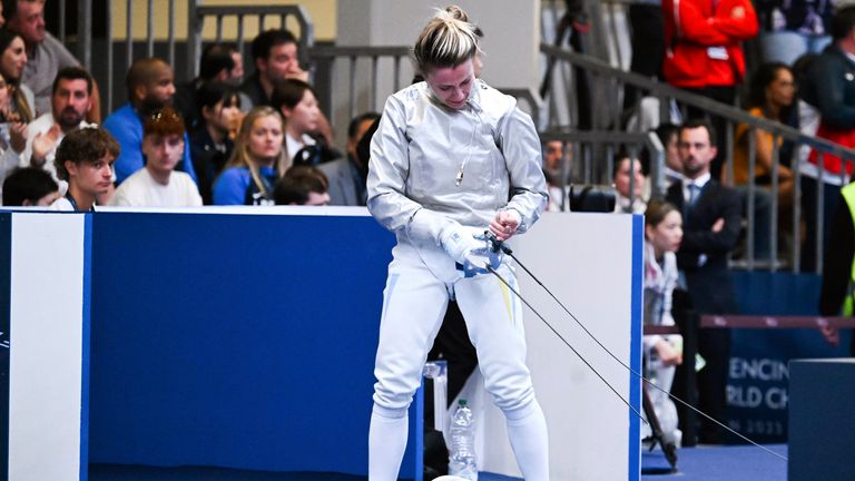 Ukraine&#39;s Olga Kharlan leaves after her bout with Russia&#39;s Anna Smirnova in the women&#39;s individual sabre best of 64 round match, during the FIE World Fencing Championship, in Milan, Italy, Thursday, July 27, 2023. Olympic champion Kharlan competed against officially-neutral Russian opponent Smirnova at the world fencing championships, an Olympic qualifier, on Thursday in Milan, Italy, winning their bout 15-7. However, Smirnova refused to leave after the bout in an apparent protest because Kharlan refused to shake hands at the end. (Tibor Illyes/MTI via AP)