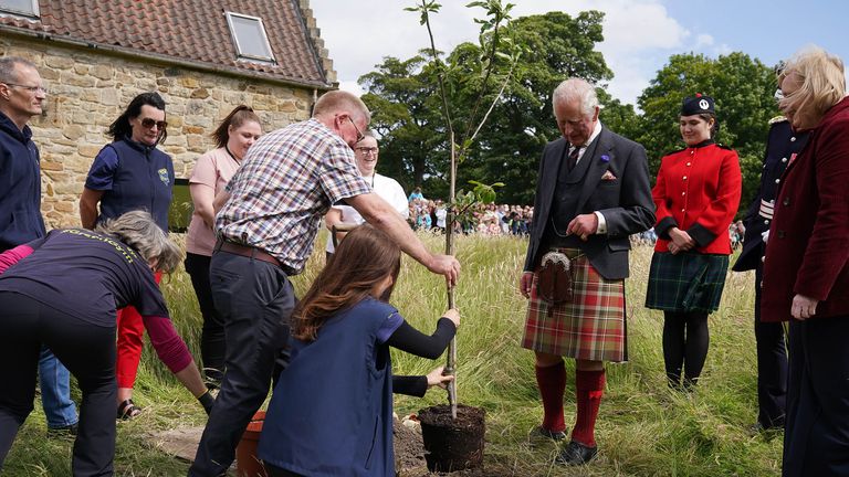 King Charles III  plants a tree to commemorate the centenary of the estate becoming a public park during his visit to Kinneil House in Edinburgh, marking the first Holyrood Week since his coronation. Picture date: Monday July 3, 2023. PA Photo. See PA story ROYAL King. Photo credit should read: Andrew Milligan/PA Wire