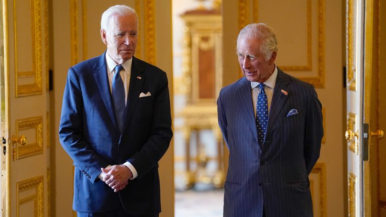 King Charles III and US President Joe Biden arrive to meet participants of the Climate Finance Mobilisation forum in the Green Drawing Room at Windsor Castle, Berkshire, during President Biden&#39;s visit to the UK. Picture date: Monday July 10, 2023. PA Photo. See PA story ROYAL Biden. Photo credit should read: Andrew Matthews/PA Wire.