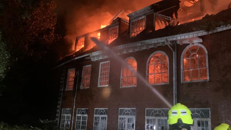 Firefighters tackle a blaze at a derelict mansion on The Bishops Avenue, Hampstead, London, also known by the nickname Billionaire's Row