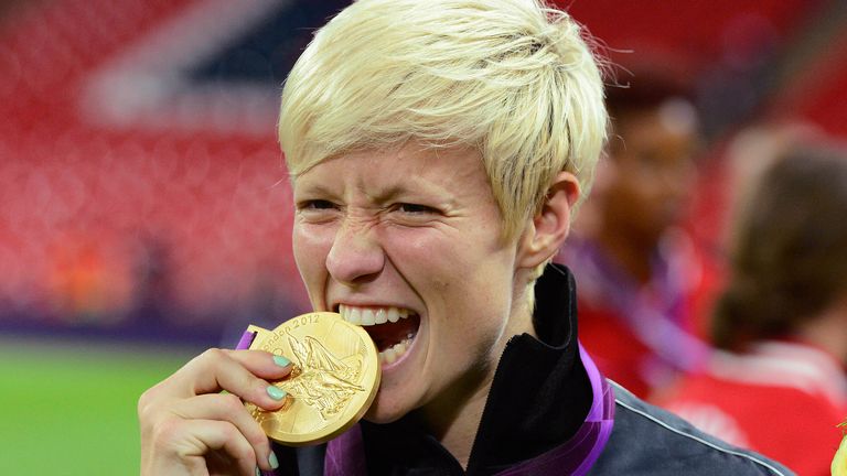 Rapinoe of the U.S. celebrates after defeating Japan in the women&#39;s final soccer match at the London 2012 Olympic Games in London at Wembley Stadium