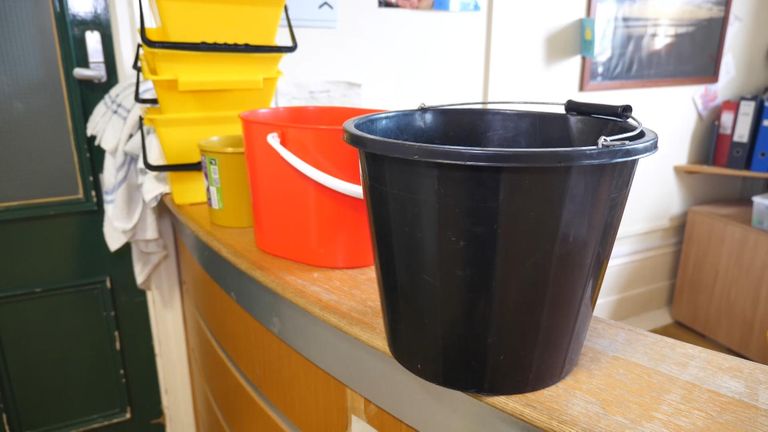 Buckets were put out in the waiting room to catch water