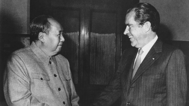 FILE - In this Feb. 21, 1972, file photo, Chinese communist party leader Mao Zedong, left, and U.S. President Richard Nixon shake hands as they meet in Beijing, China. Tossed into the middle of a potential thawing in U.S. relations with China, Judy Bochenski and her American ping pong teammates helped deliver one of the great diplomatic coups of their time. Their hastily arranged trip for exhibitions in three Chinese cities helped part the Red Curtain and open the way to a new world order that i