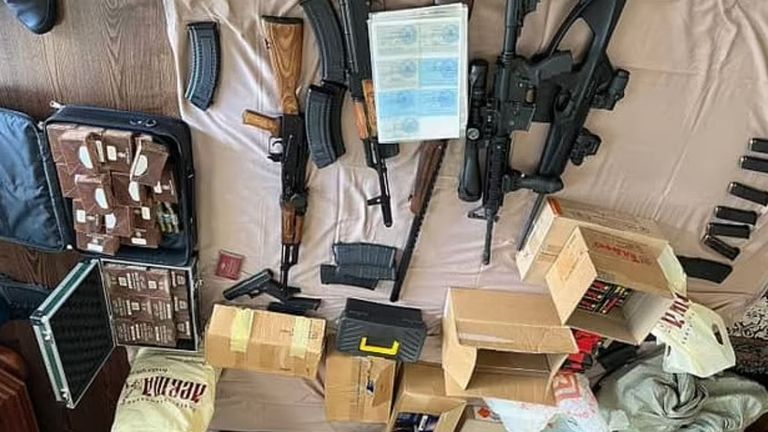Guns and ammo found during the raid. Pic: Izvestia