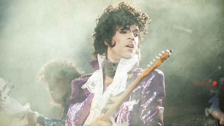 Rock singer Prince performs at the Forum in Inglewood, Calif., during his opening show, Feb. 18, 1985. (AP Photo/Liu Heung Shing)


