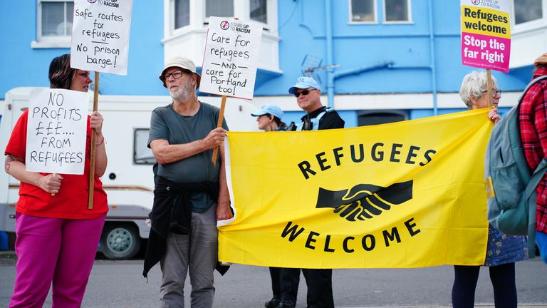 Protesters in Portland in Dorset after the Bibby Stockholm accommodation barge arrived from dry dock in Falmouth, Cornwall, where it is due to house migrants. Picture date: Tuesday July 18, 2023.