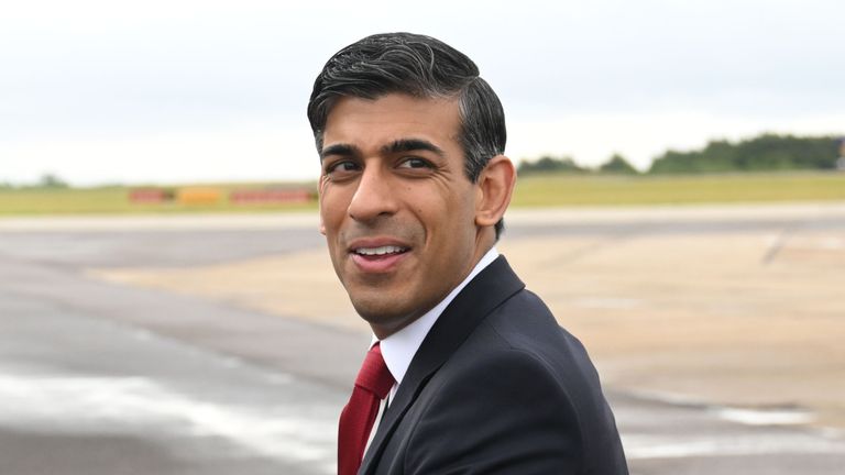 Prime Minister Rishi Sunak walks across the tarmac to board his plane at London Stansted airport, in Essex, departing to Vilnius, Lithuania, where he is to attend a NATO Summit. Picture date: Tuesday July 11, 2023.
