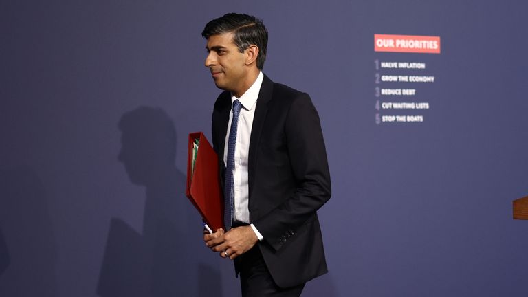 Prime Minister Rishi Sunak leaves after holding a news conference in Downing Street