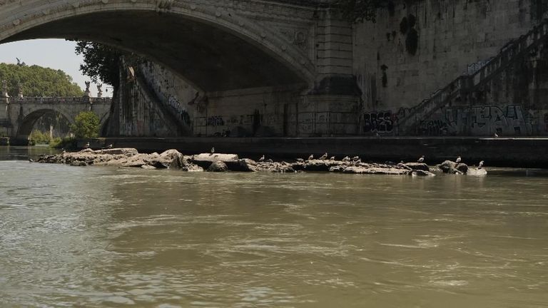 A 2,000 year-old Roman bridge exposed by the falling level of the River Tiber in Rome
