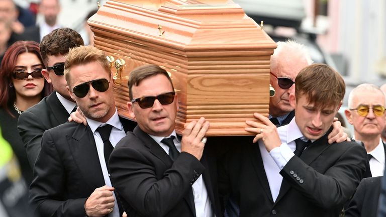 PABest Ronan Keating (centre middle left) helps carry the coffin of his brother Ciaran Keating towards St Patrick&#39;s Church in Louisburgh, Co Mayo, for his funeral. The older brother of Ronan Keating died in a two-car crash near Swinford in Co Mayo on Saturday. Picture date: Thursday July 20, 2023.


