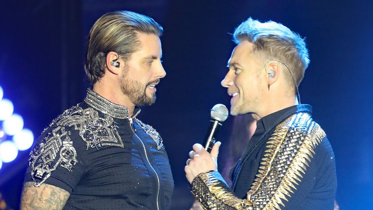 EDITORIAL USE ONLY (left to right) Keith Duffy and Ronan Keating of Boyzone on stage at the SSE Arena, Belfast, as part of the band&#39;s Thank You & Goodnight farewell tour.
