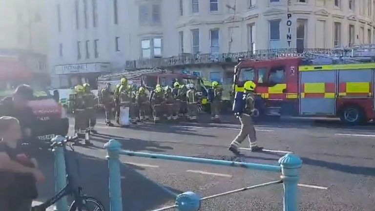 Firefighters battle a blaze at the Royal Albion Hotel, in Brighton, Sussex.