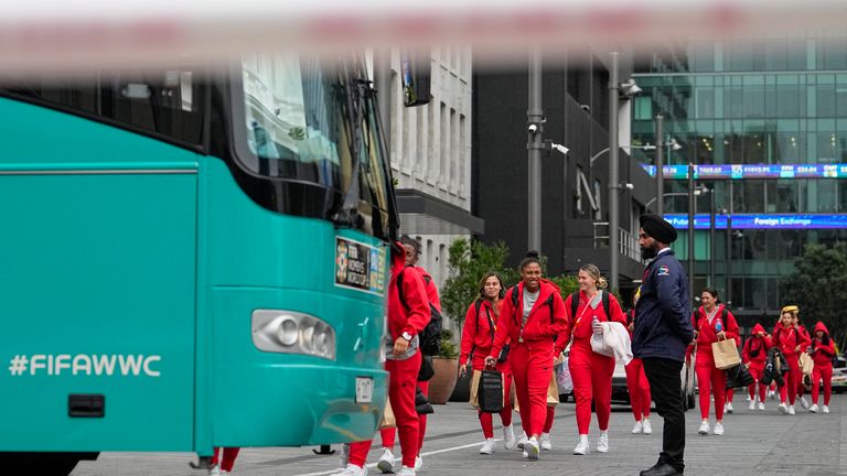 Members of the Philippines Women&#39;s World Cup team walk to their team bus following a shooting near their hotel in the central business district in Auckland, New Zealand, Thursday, July 20, 2023. A gunman killed two people before he died Thursday at a construction site in Auckland, as the nation prepared to host games in the FIFA Women&#39;s World Cup soccer tournament.(AP Photo/Abbie Parr)