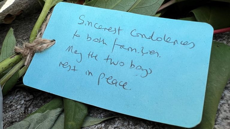 Flowers, cards outside St Michael’s College today