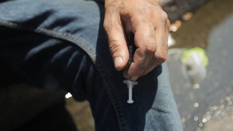 In this neighbourhood, people openly inject the 'zombie drug' Tranq on every street corner